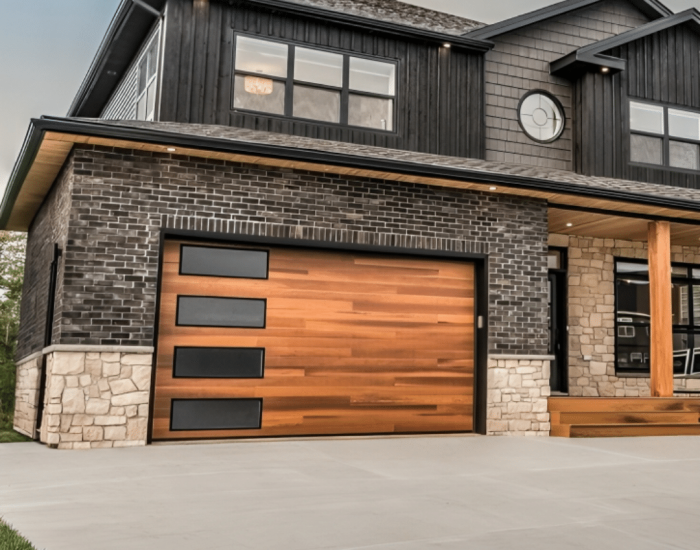 Garage Door Broken Spring Repair by Expert Technician Technician replacing a broken garage door spring with professional tools